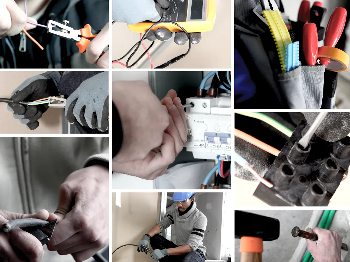 Artisan électricien au travail à Achères
